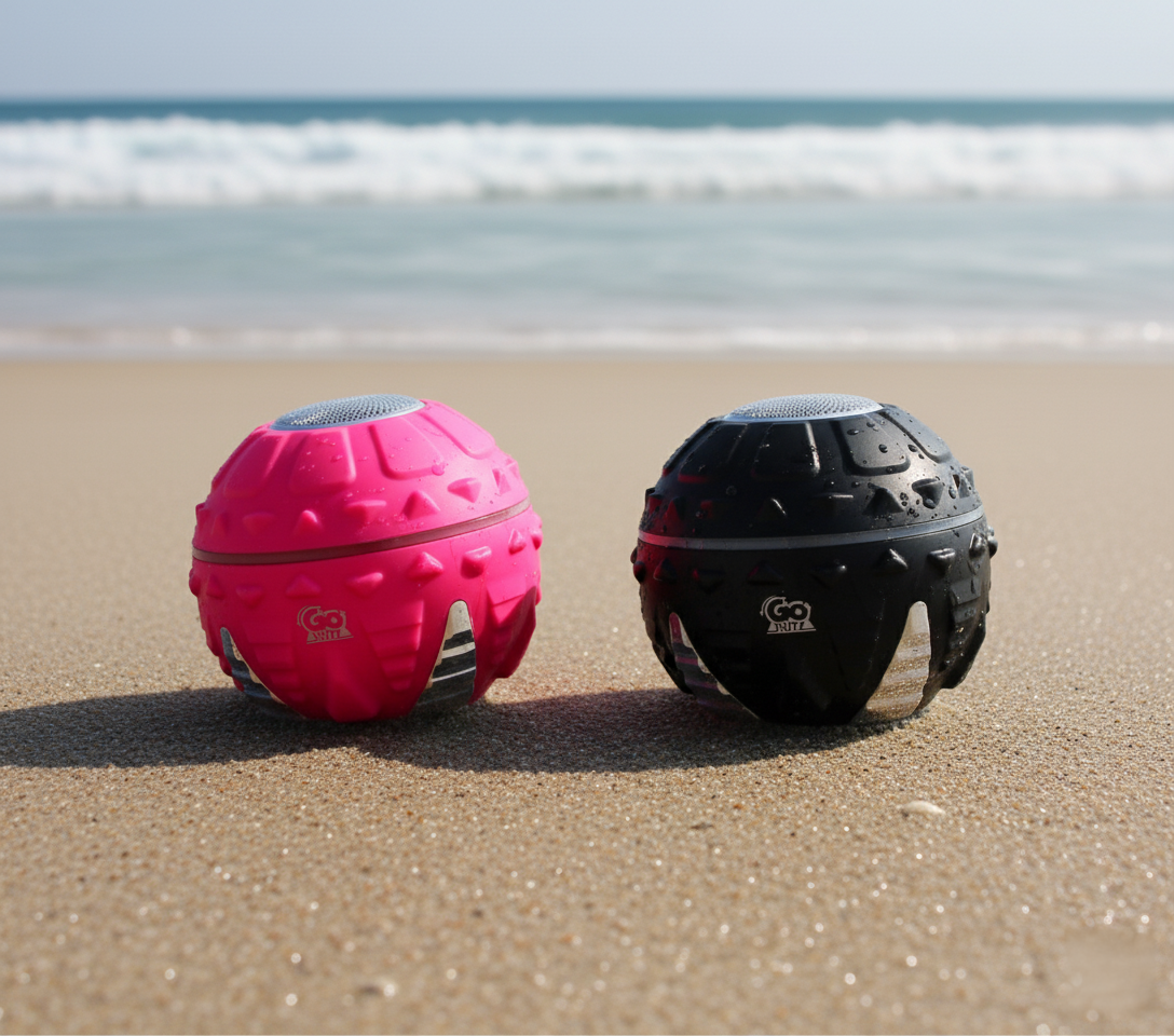 Pink and black shavers on a sandy beach